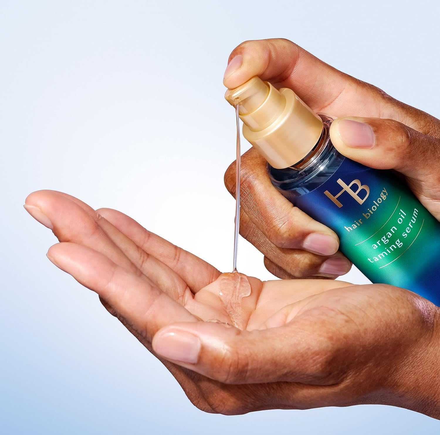 Hair Biology Argan Oil Taming Serum applied to damp hair for smooth ends and shine