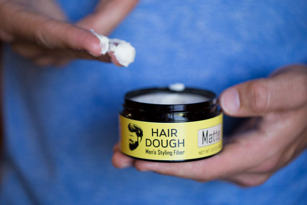 Hair Dough Styling Clay jar closeup — texture-rich paste with easy wash-out.