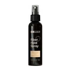 Close-up of real fibers blending with hair for discreet coverage by Hair Illusion.