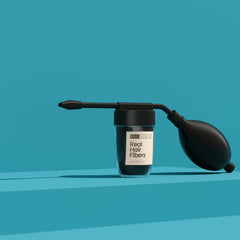 Hair Illusion spray applicator demonstrates precise aim for targeted application.