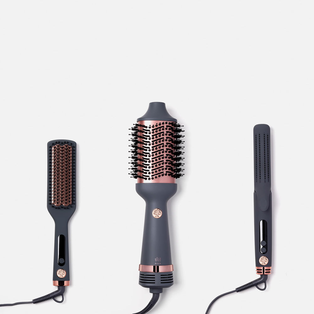 Hairitage Matte Grey blowout tool combines dryer and brush for quick, sleek styling.