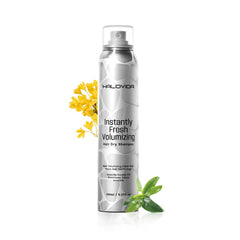 HALOVIDA dry shampoo bottle releasing fine mist for quick refresh and volume.