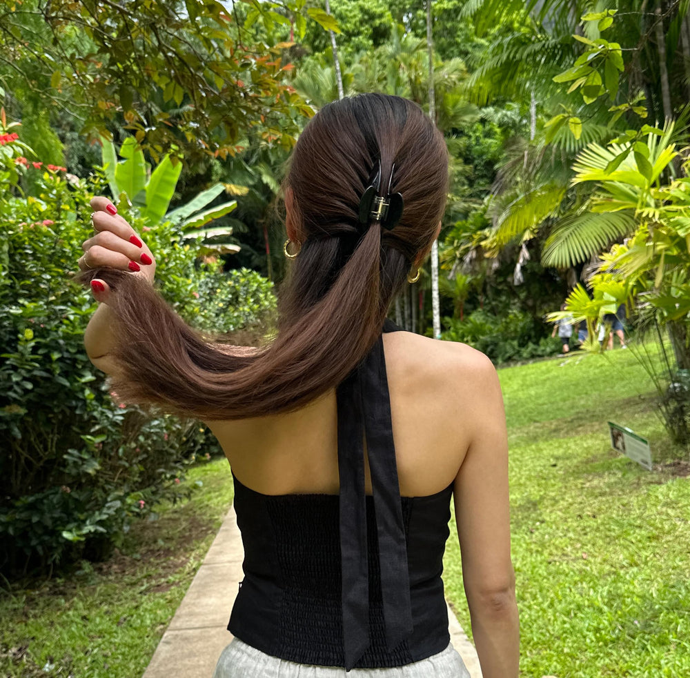 Hana Mia no-slip claw clip demonstrating secure grip during busy days.