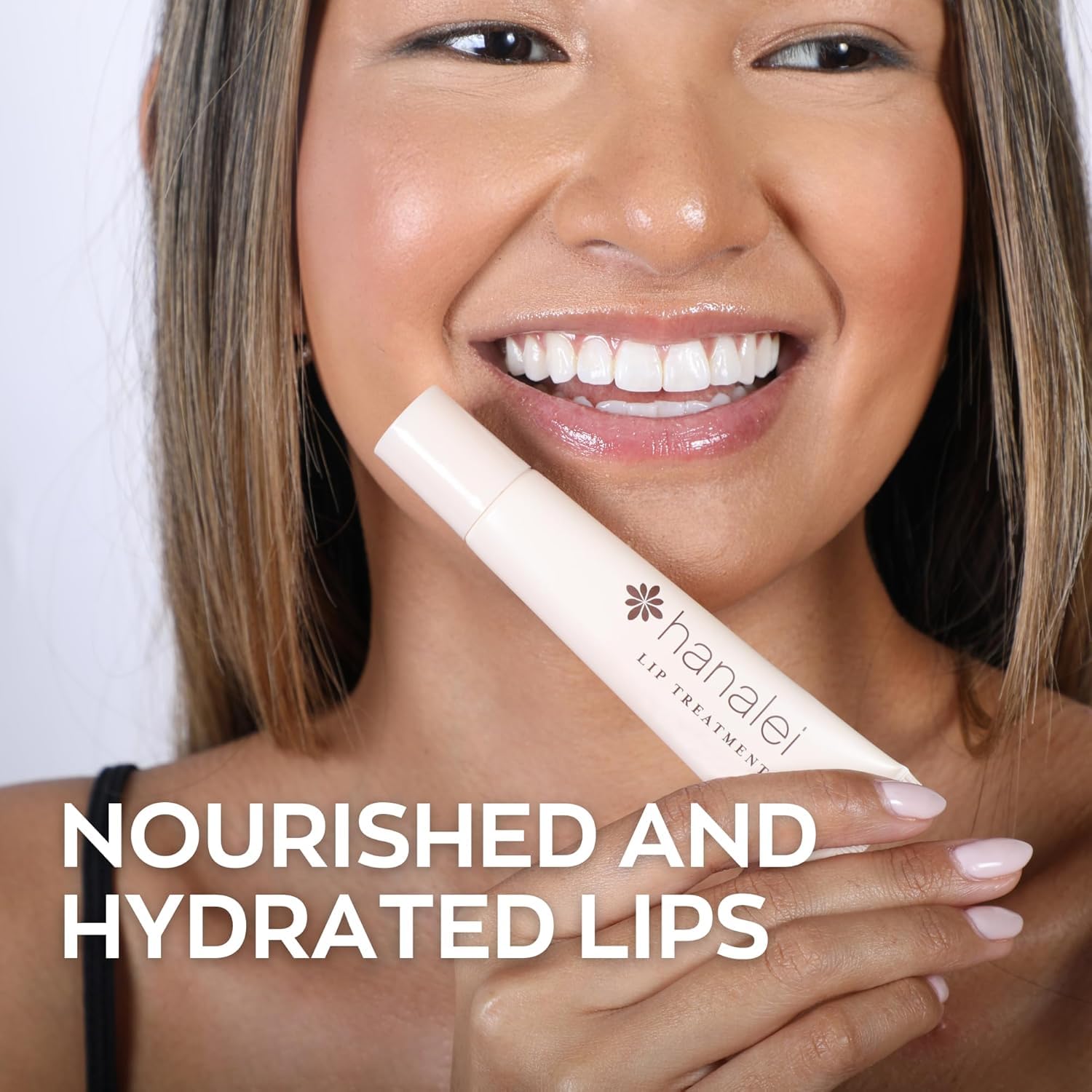 Back view of Hanalei lip treatment tube showing ingredients and daily care use.