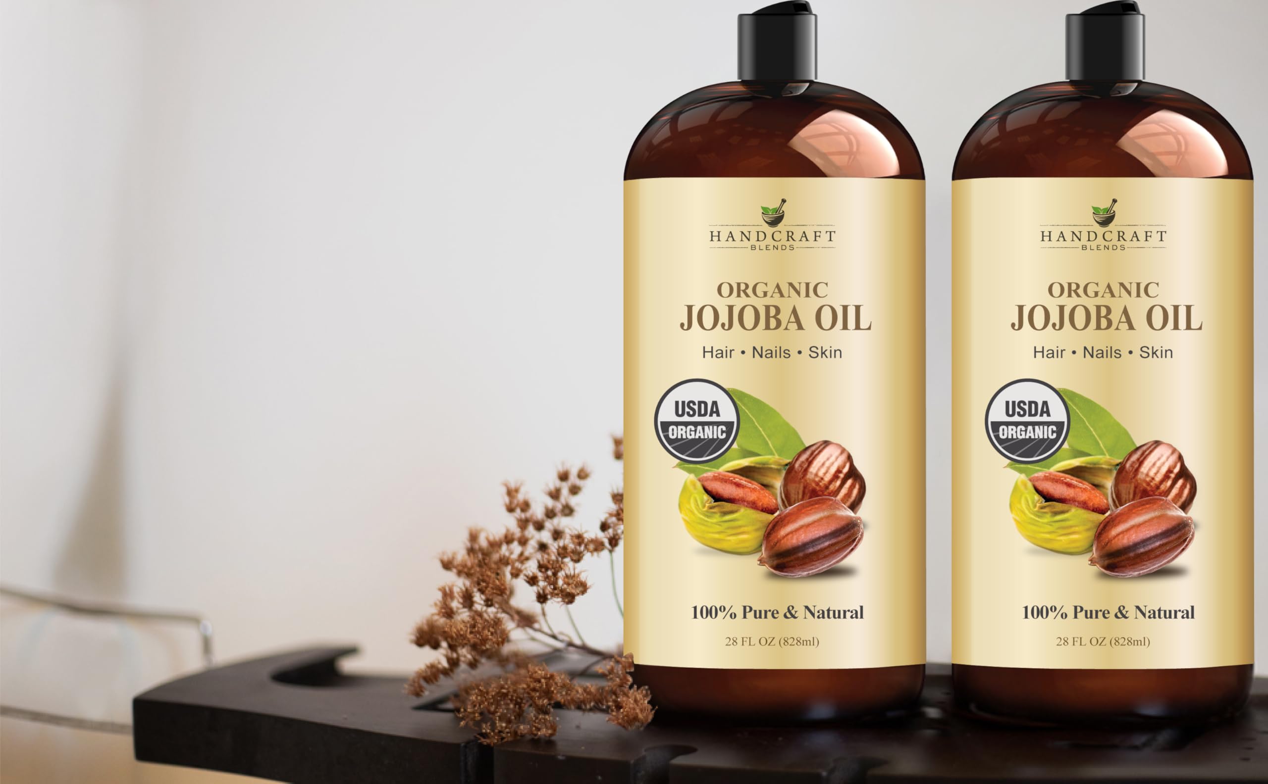 Handcraft Blends Jojoba Oil applying to skin for hydration and glow.