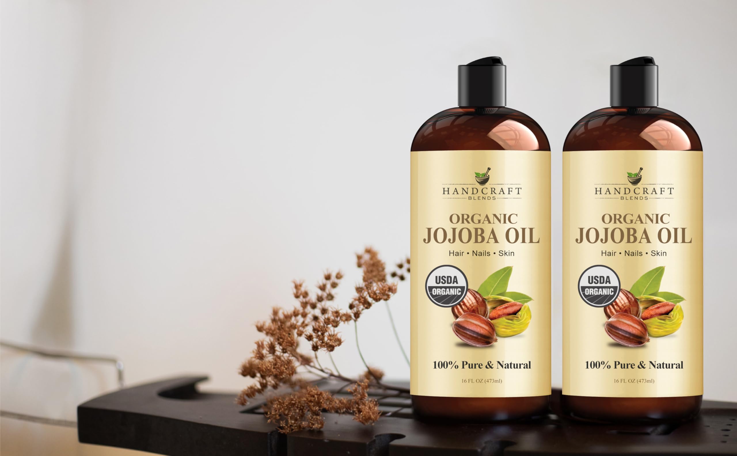 Handcraft Blends Jojoba Oil bottle on shelf, daily beauty and aromatherapy use.