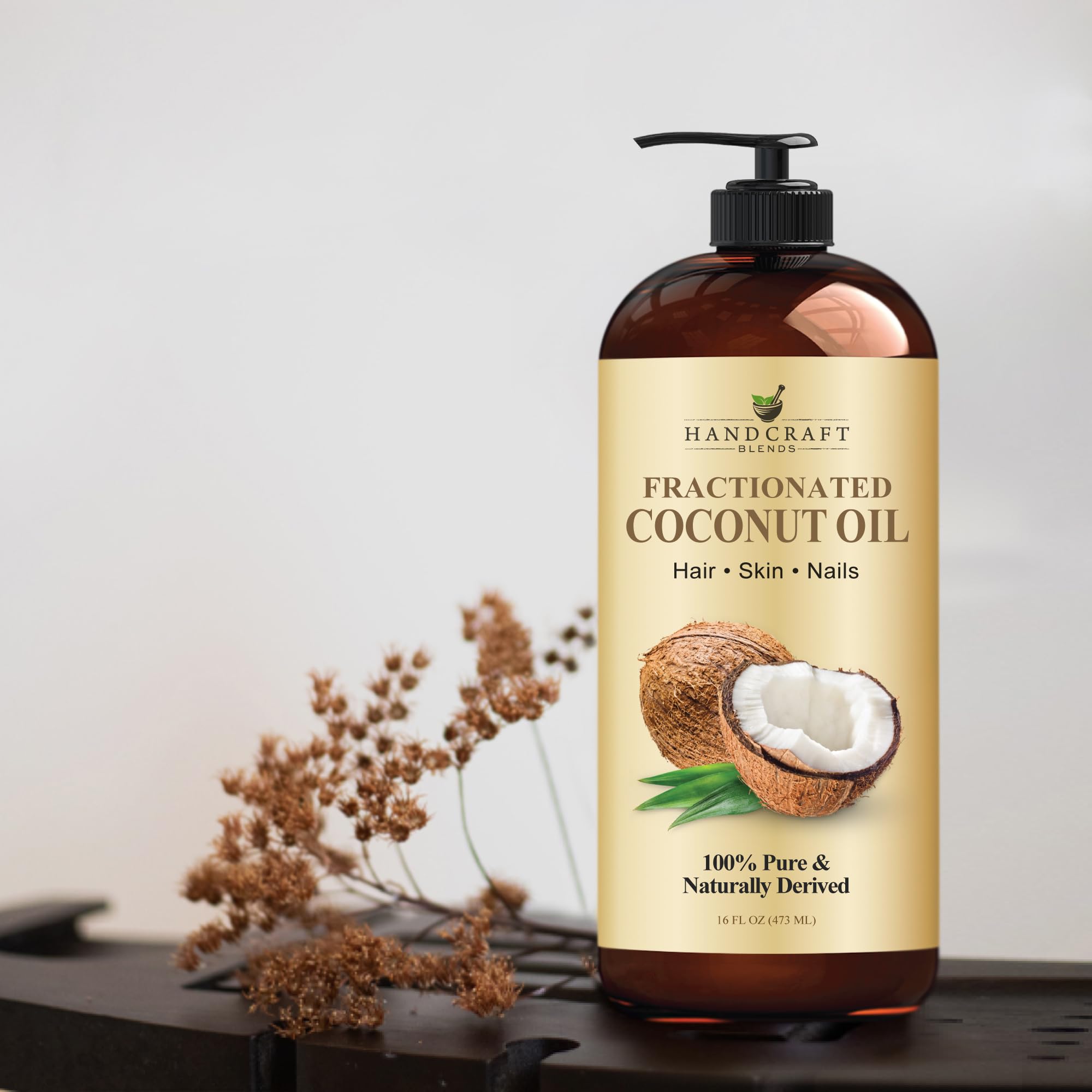 Handcraft Blends bottle held in hand showing 16 fl oz size for value comparison