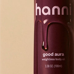 HANNI Good Aura jojoba oil focus image suggesting nourishing hydration.