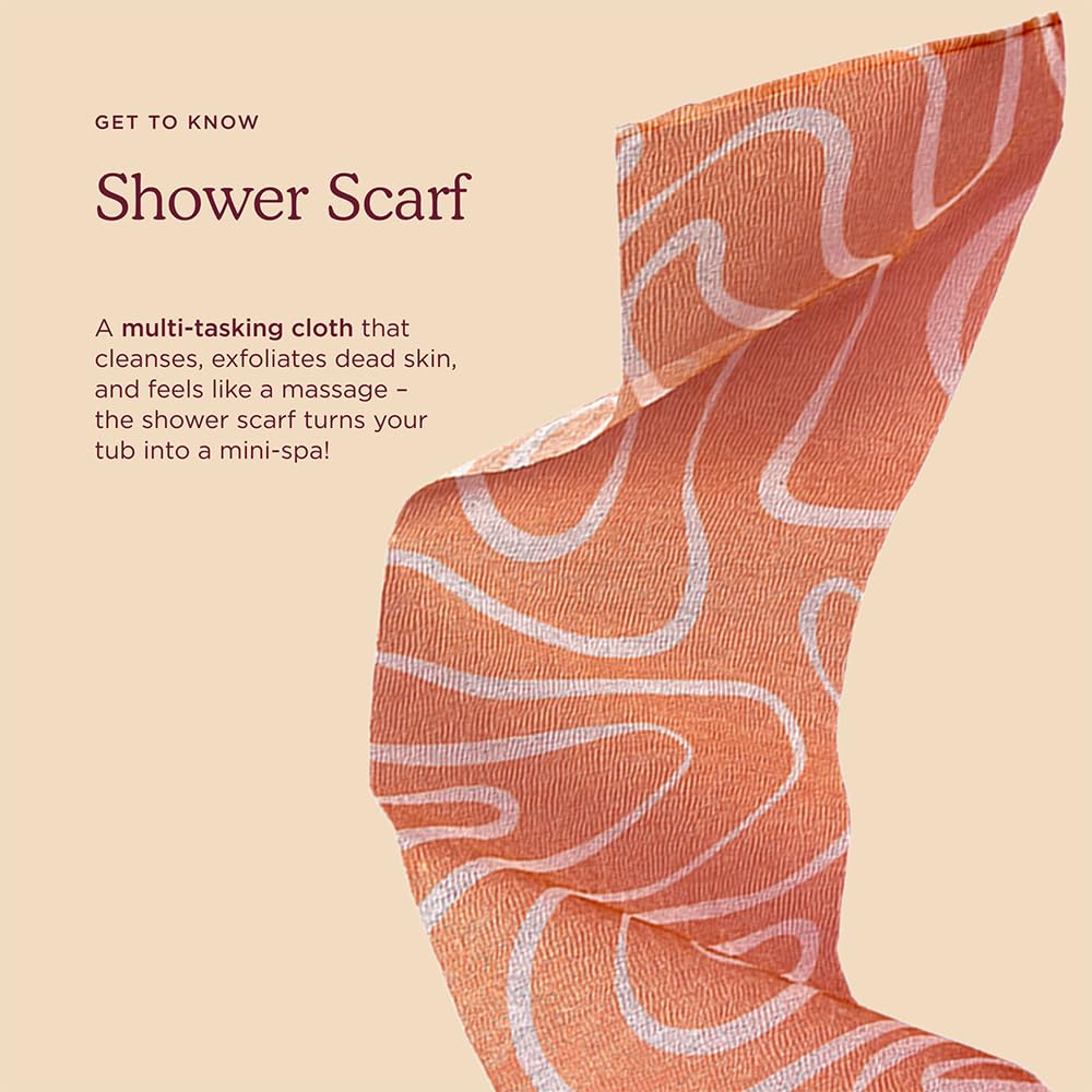 HANNI Shower Scarf in use on body demonstrating cleansing and massage-like relief.