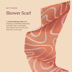 HANNI Shower Scarf in use on body demonstrating cleansing and massage-like relief.