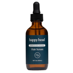 Happy Head Hair Regrowth Serum bottle shows a lightweight leave-in formula for daily scalp nourishment