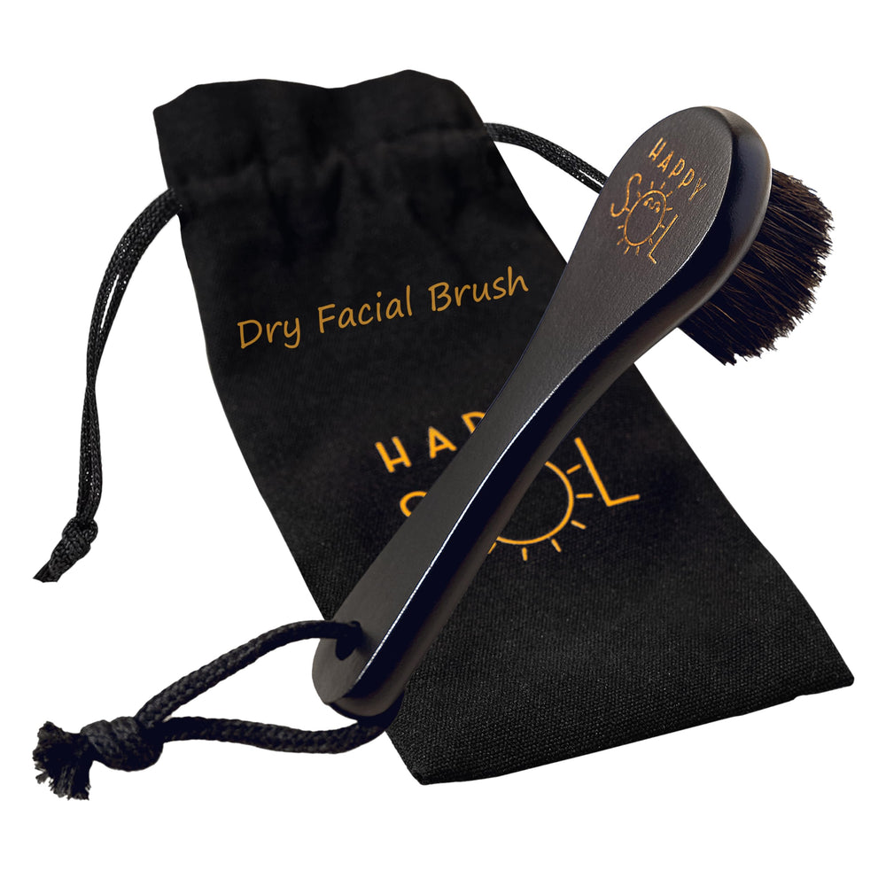 Happy Sol dry facial brush close-up with beechwood handle for gentle exfoliation.