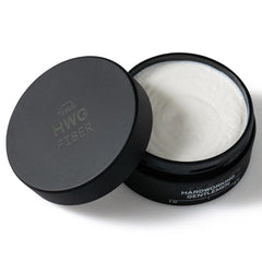 Hardworking Gentlemen pomade jar close-up for matte finish styling versatility.