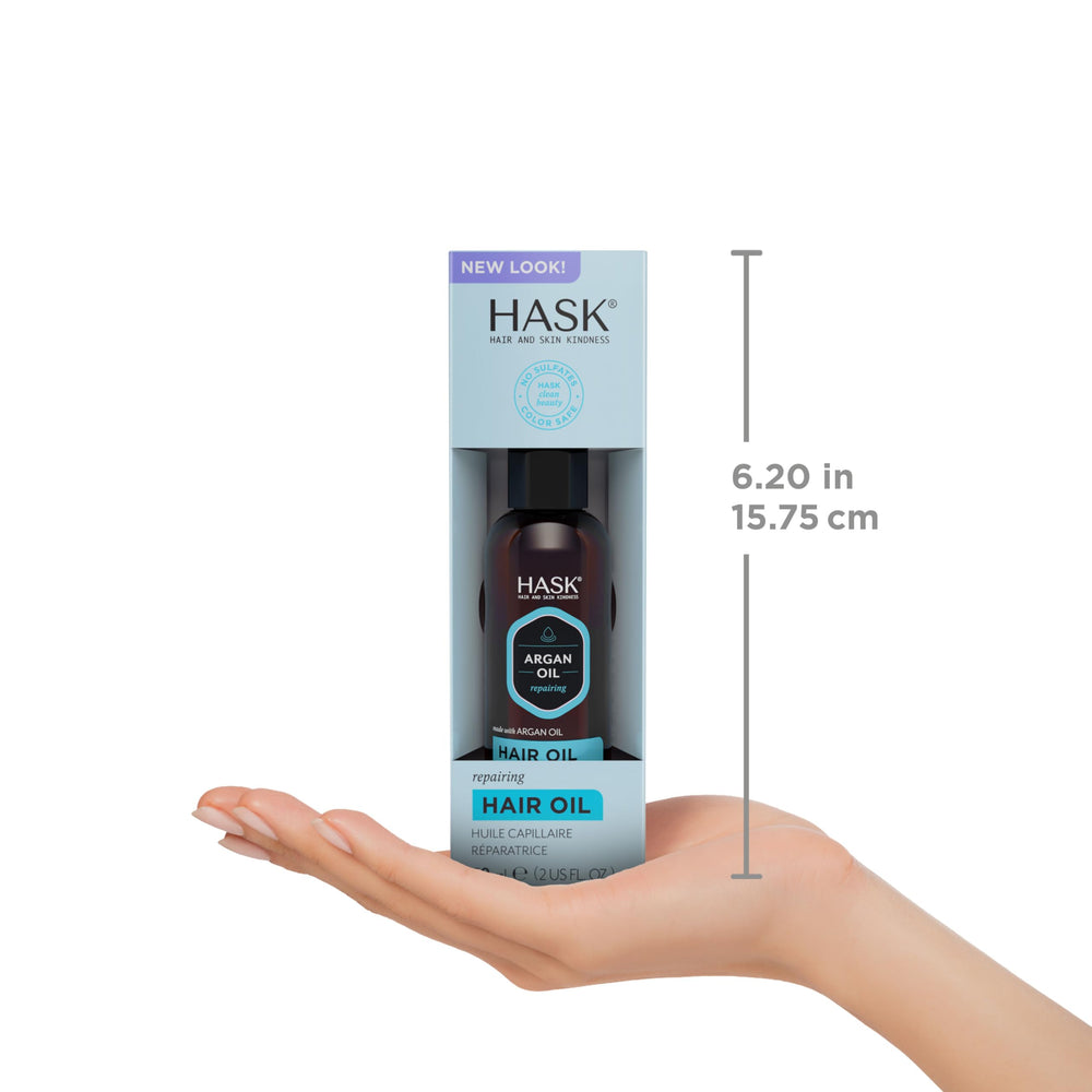 HASK Argan Repairing Hair Oil label highlights gluten-free and sulfate-free formula benefits.