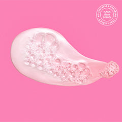 HASK Keratin Smoothing Shampoo with lush lather smoothing unruly hair.
