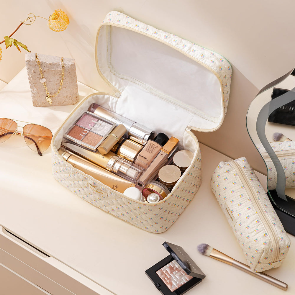 HBselect makeup bag with gold zipper detail for smooth opening and secure storage.