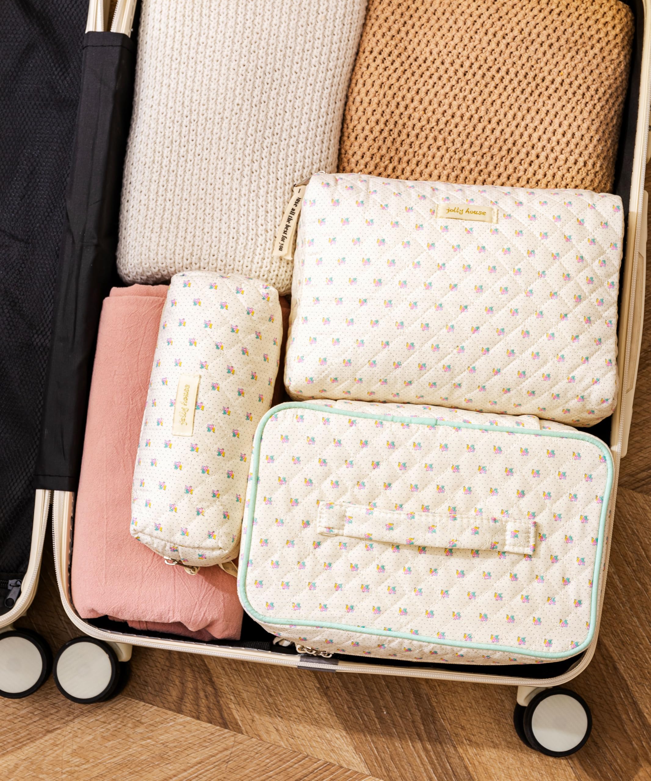 HBselect makeup bag large capacity front view holding cosmetics and brushes.