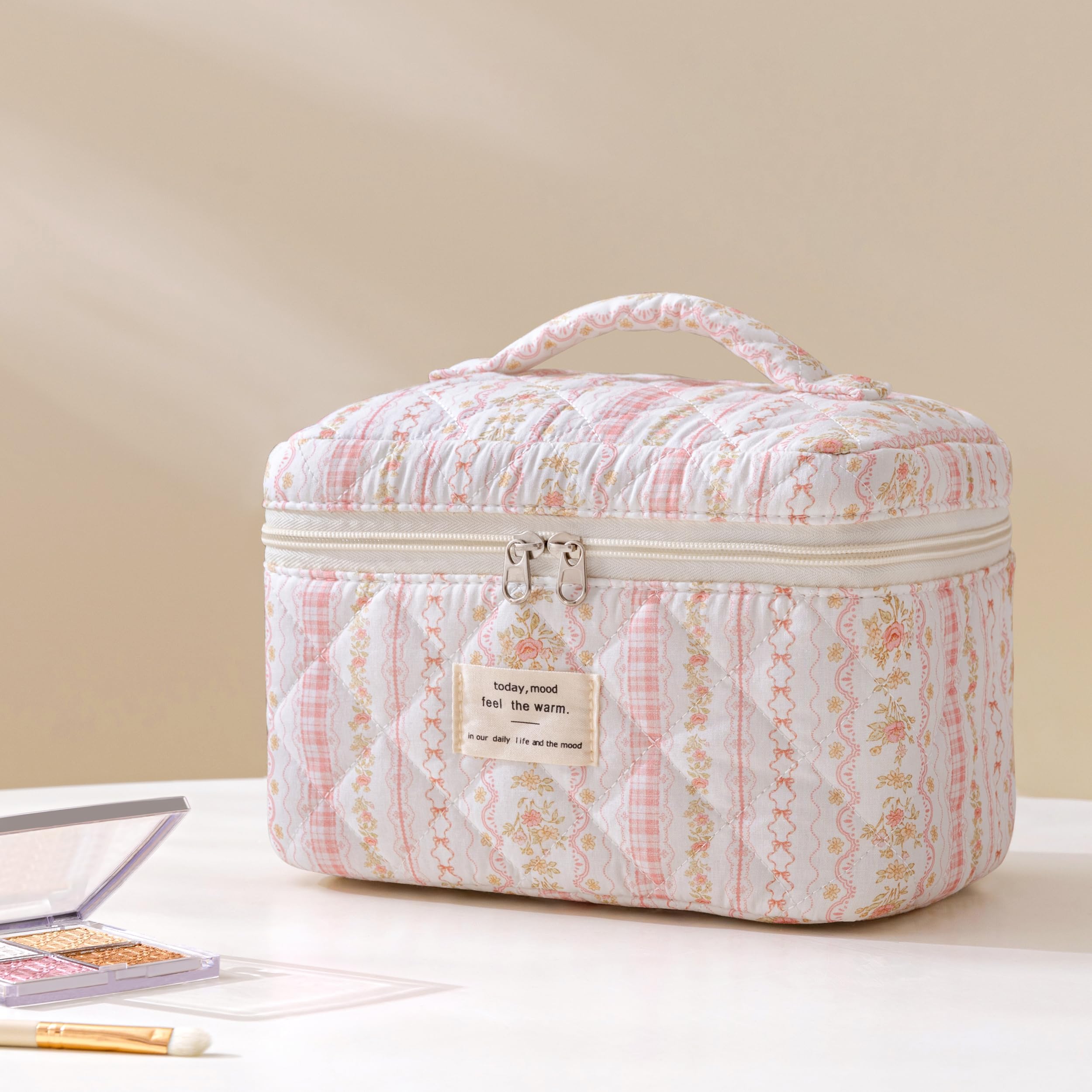 HBselect quilted makeup bag travel setup staged with essentials, illustrating portability.