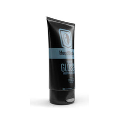 HeadBlade HeadLube Glossy bottle front showing dye-free formula for sensitive scalps