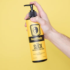 Applying HeadSlick on the scalp with a HeadBlade for smooth glide.