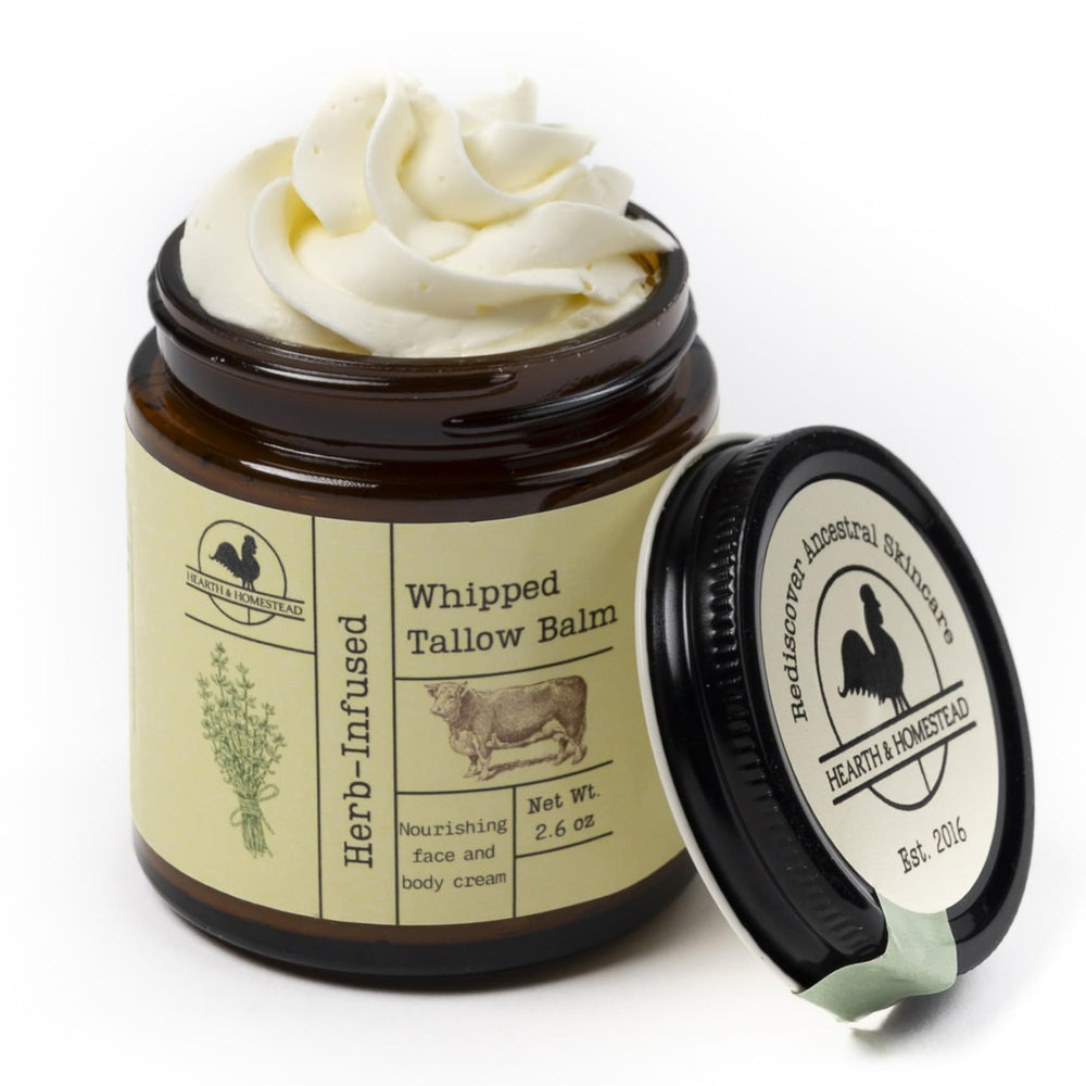 Hearth and Homestead whipped tallow balm in large jar closeup shows rich moisture for dry skin.