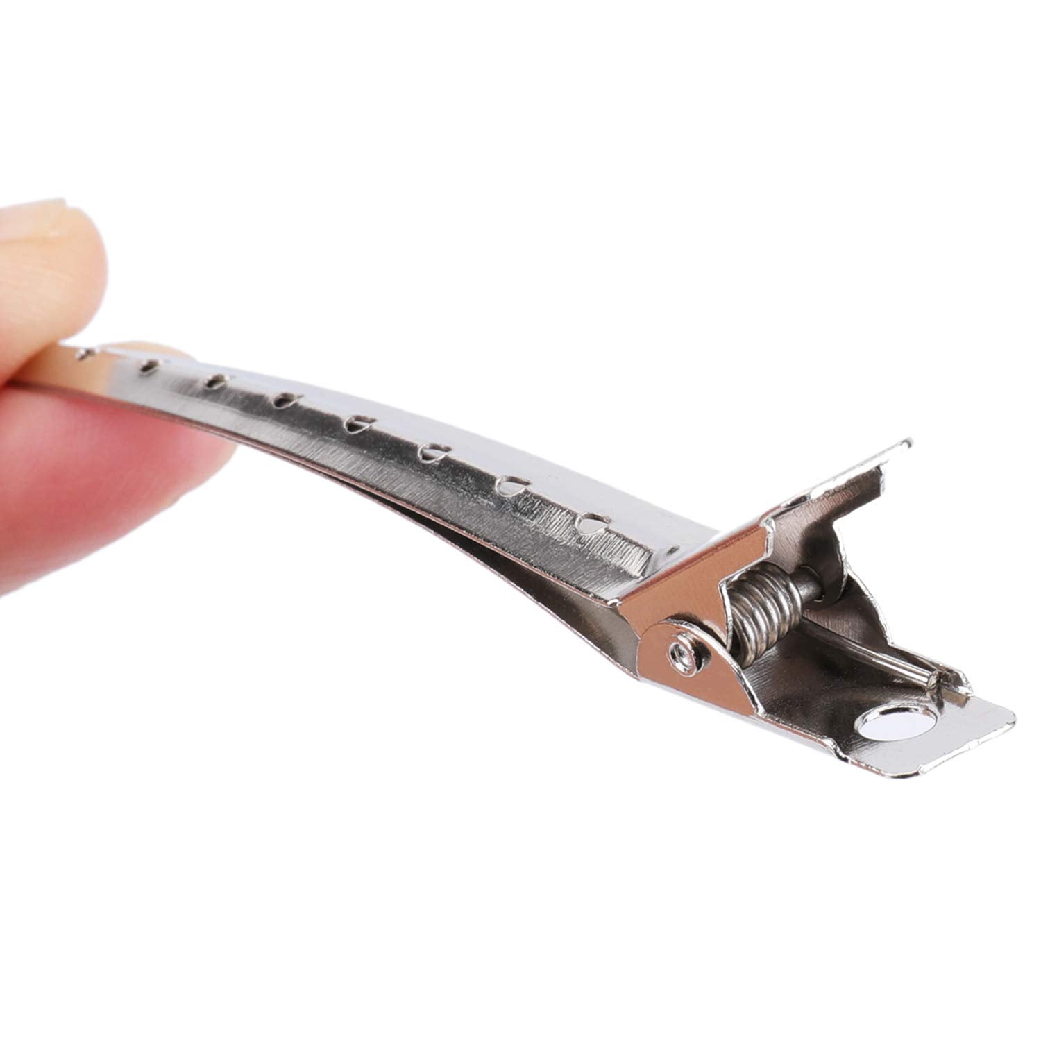 Hedume alligator clip salon use demonstrates reliable grip during cutting and styling