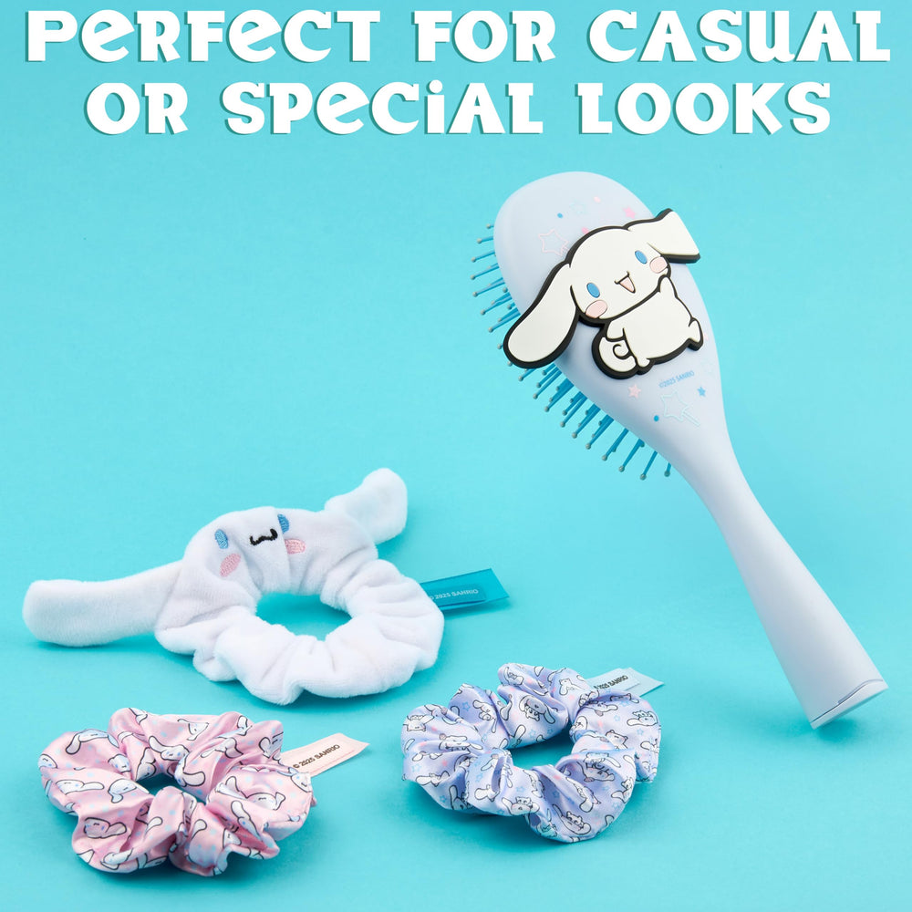 Hello Kitty brush with travel pouch keeps styling tools ready.