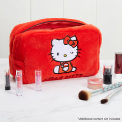 Hello Kitty fluffy makeup bag open compartment illustrates spacious interior for cosmetics and skincare on the go.