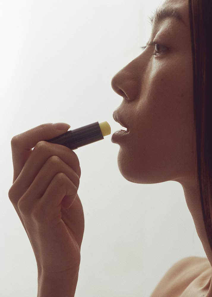 Henné Organics luxury packaging closeup highlighting sleek Scandinavian-inspired design