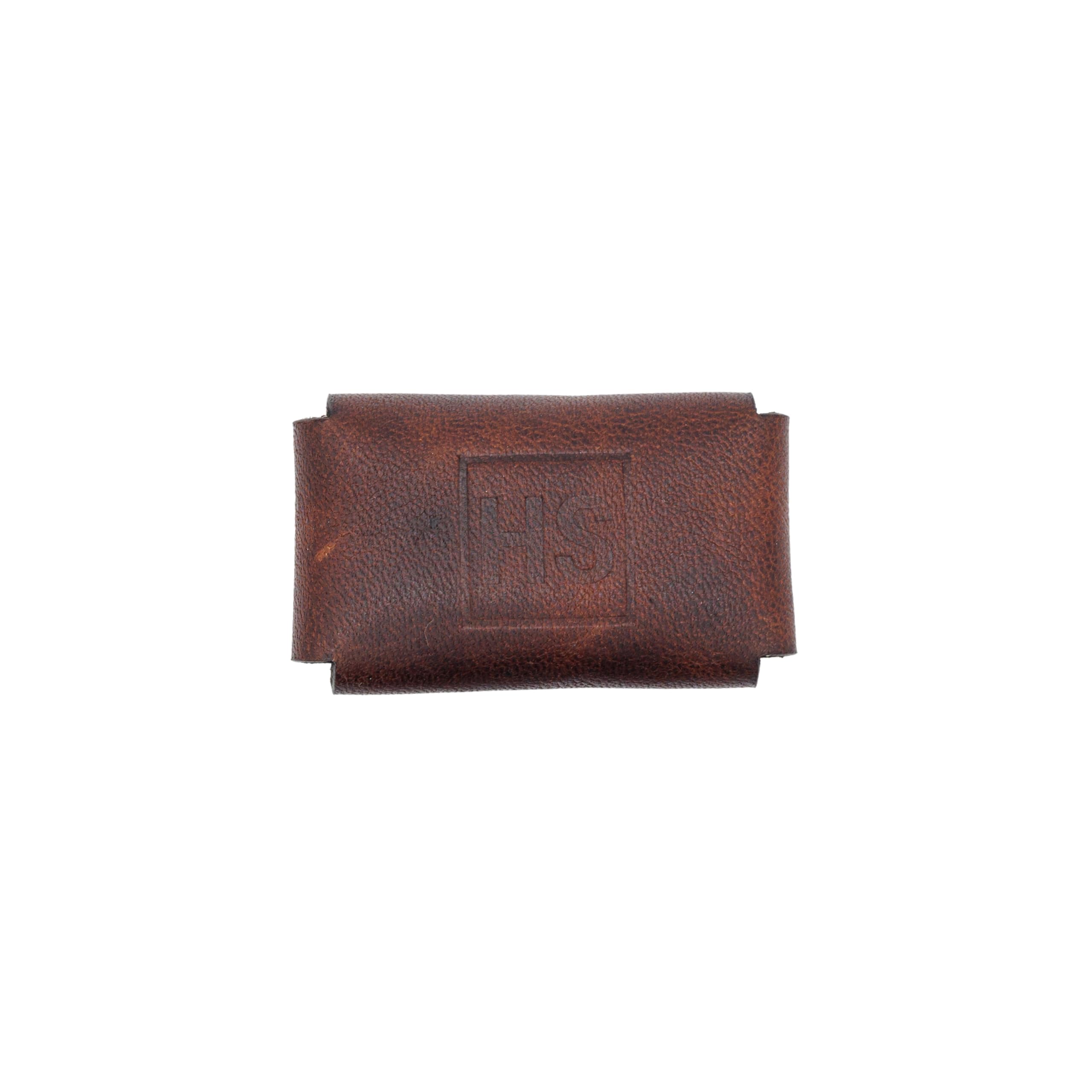 Henson Shaving brown leather razor sheath offers durable travel protection and easy blade access.