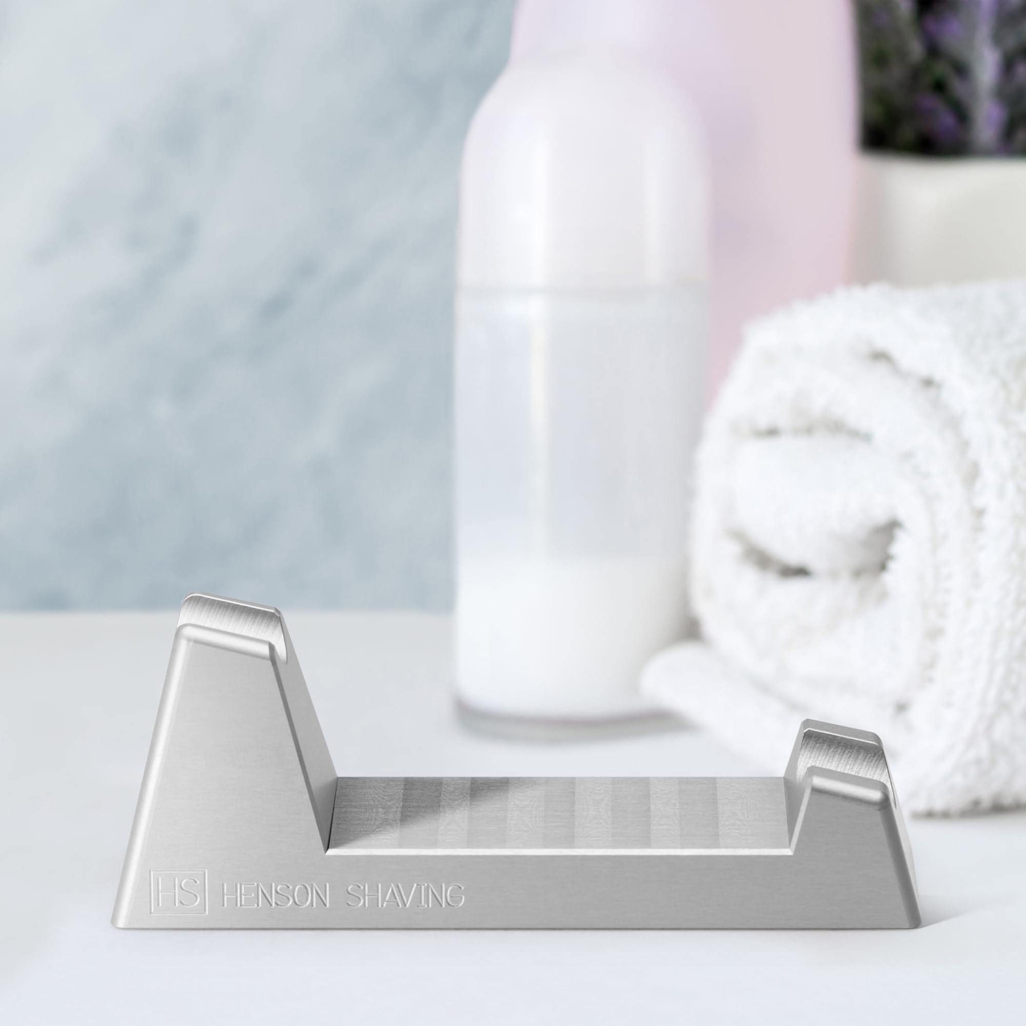 The Henson Shaving Stand elegant-display showcases your razor with minimal footprint.