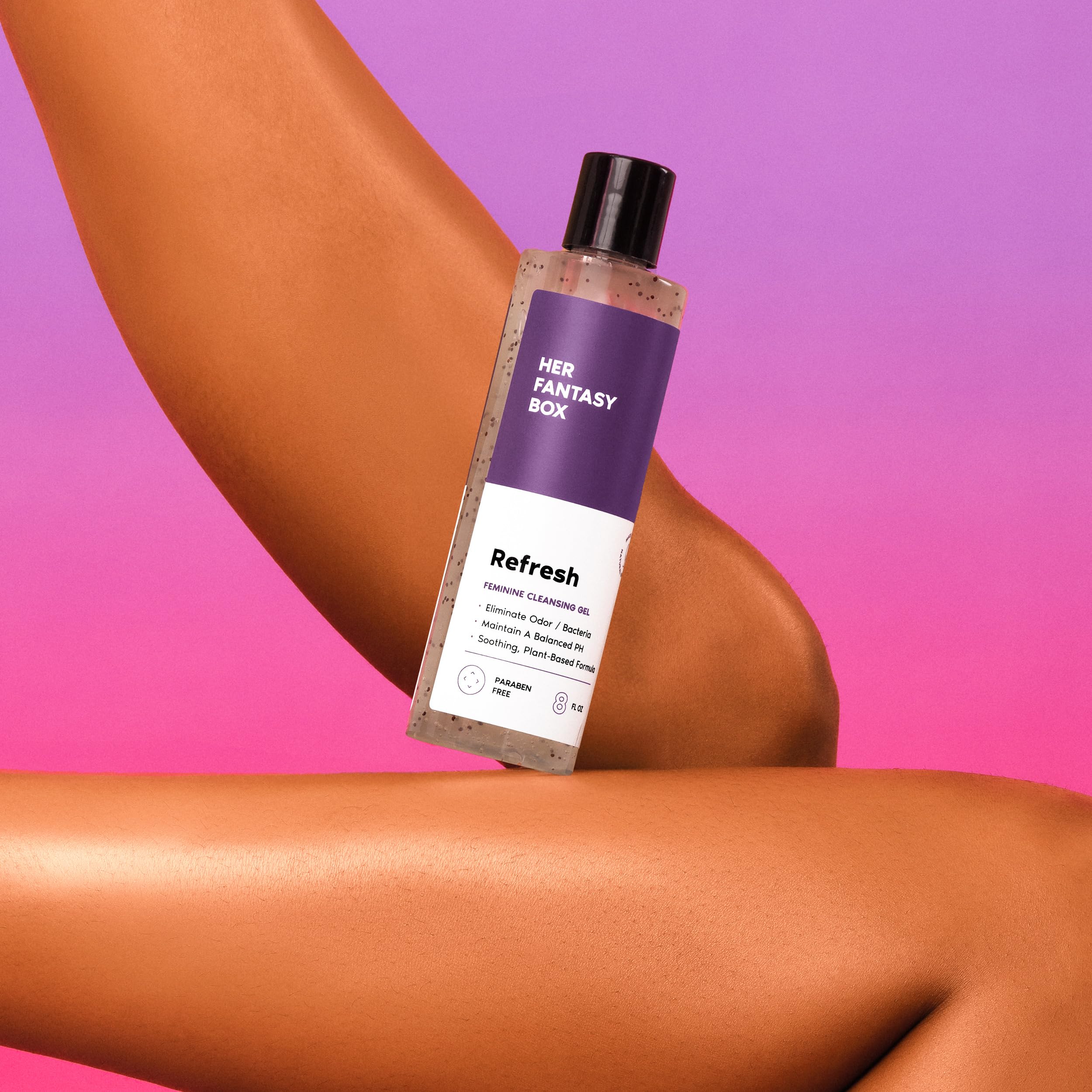 Her Fantasy Box Refresh bottle shows peppermint cooling for a fresh post-shower feel.