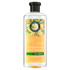 Herbal Essences Orange Citrus Blossoms bottle pour signals a refreshing cleanse