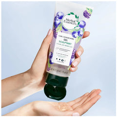 Herbal Essences Totally Twisted curl scrunch—gel texture for frizz control.