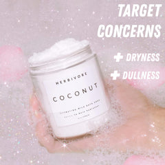 HERBIVORE Coconut Milk Bath Soak spa setup conveys relaxing self-care with coconut scent