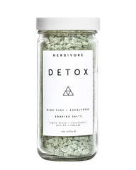 HERBIVORE Detox Soaking Salts bottle pour for a soothing spa-like bath ritual.