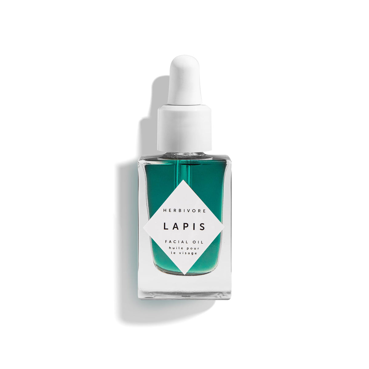Herbivore Lapis Facial Oil bottle close-up showing balanced hydration for oily skin
