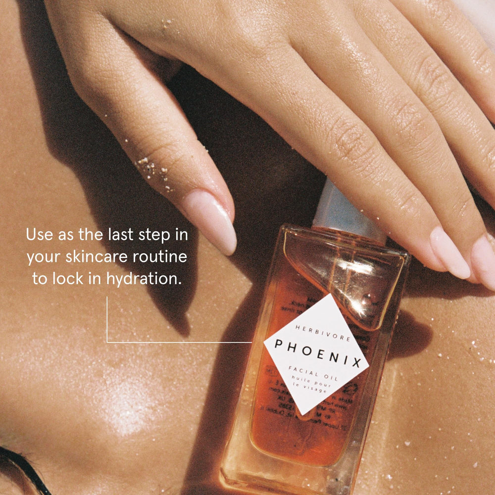 Herbivore Phoenix Face Oil in hand – massage to aid absorption before makeup.
