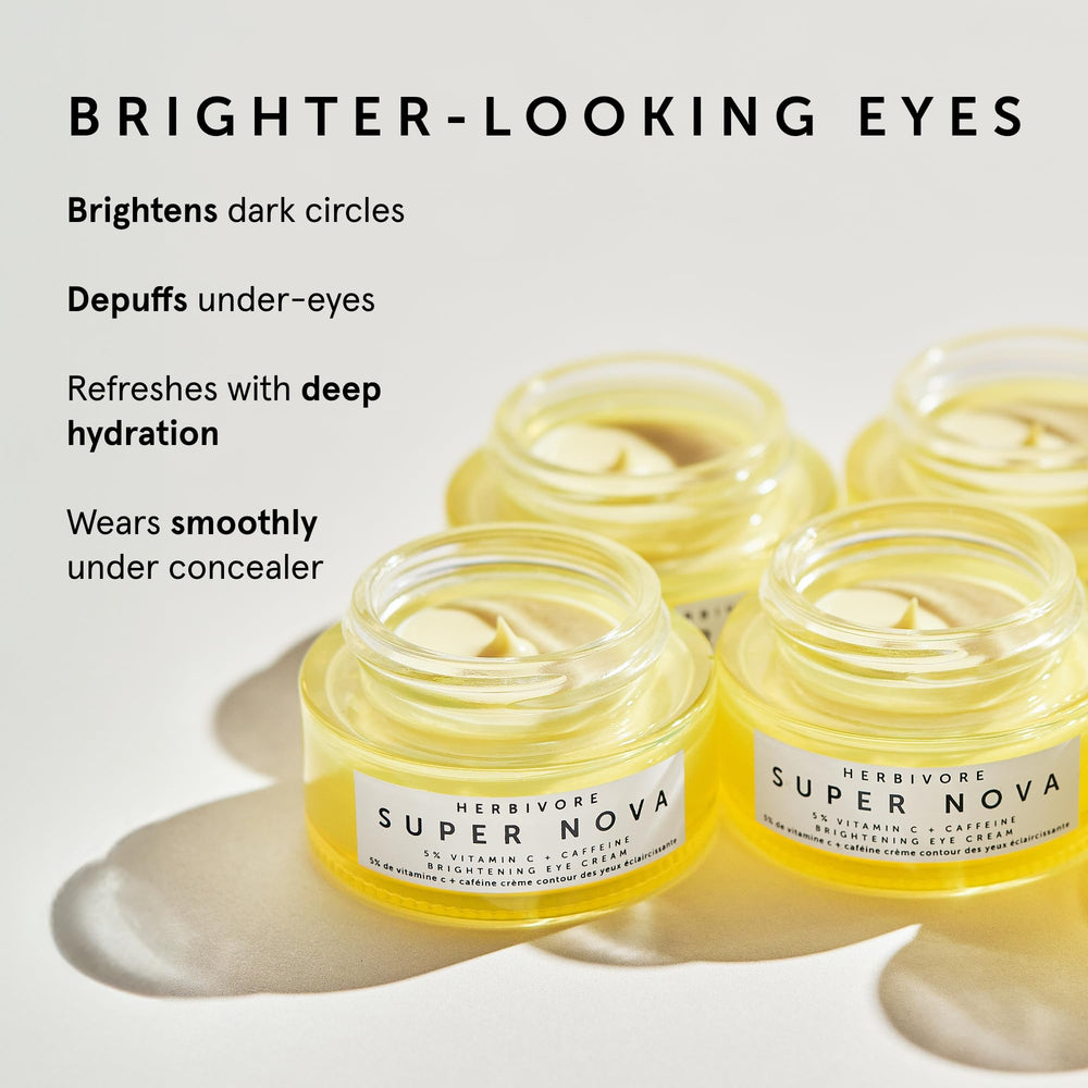 HERBIVORE Super Nova eye cream being gently tapped under the eye