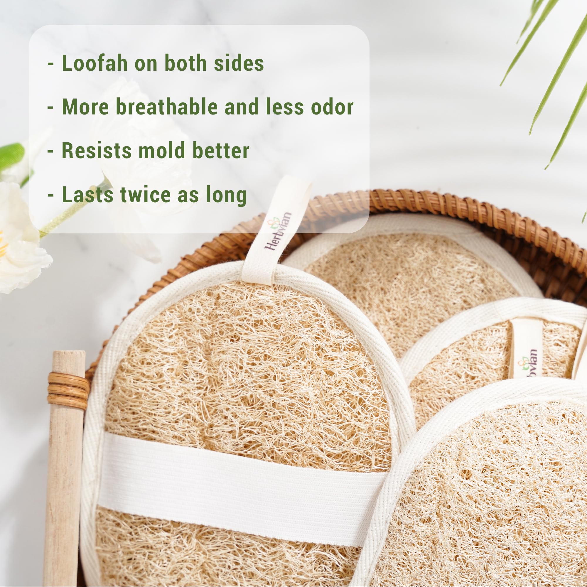 Herbvian loofah pads during wet use highlights gentle exfoliation with soap.