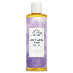Heritage Store Aura Glow Rose Body Oil bottle closeup showing elegant packaging for smooth hydration.