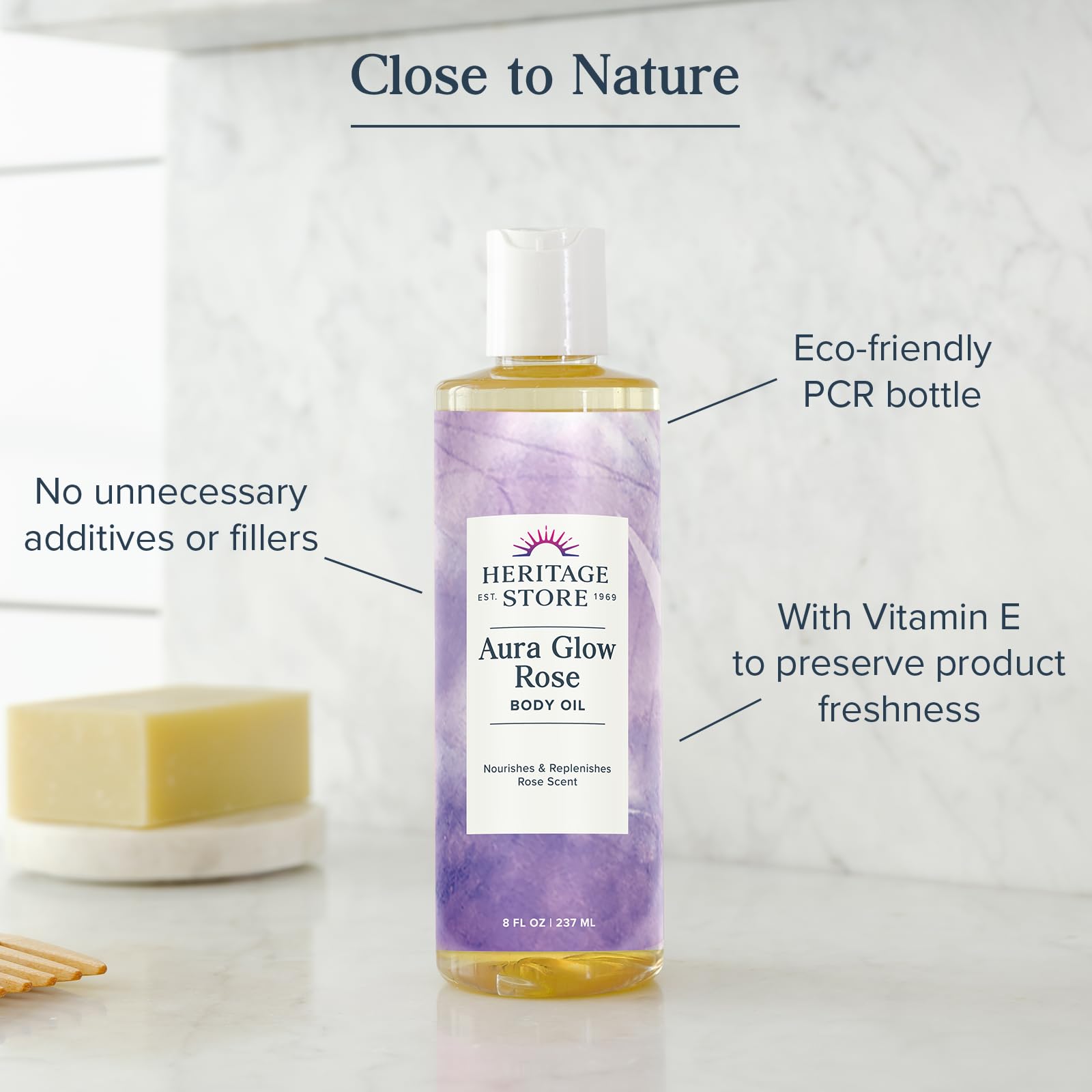 Aura Glow Rose Body Oil on dry elbows for targeted skin relief and hydration.
