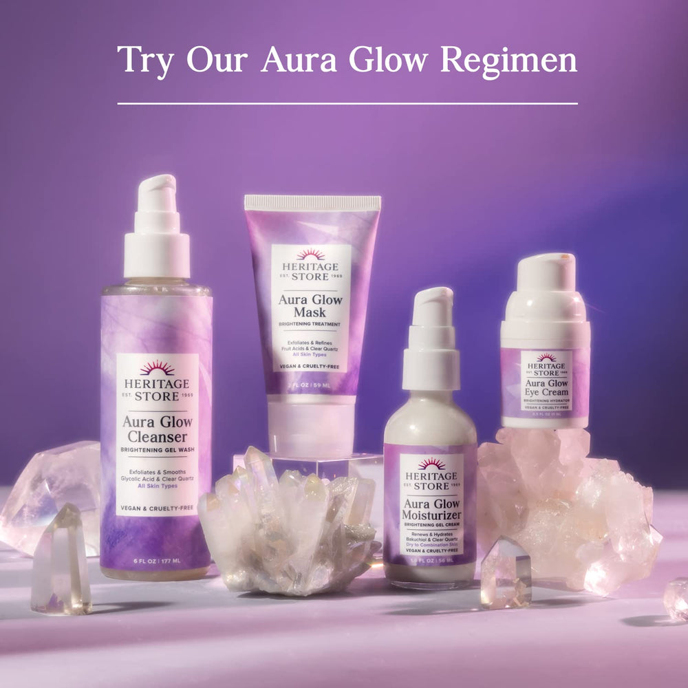Close-up of Aura Glow Rose Body Oil ingredients highlighting olive fruit oil and vitamin E.