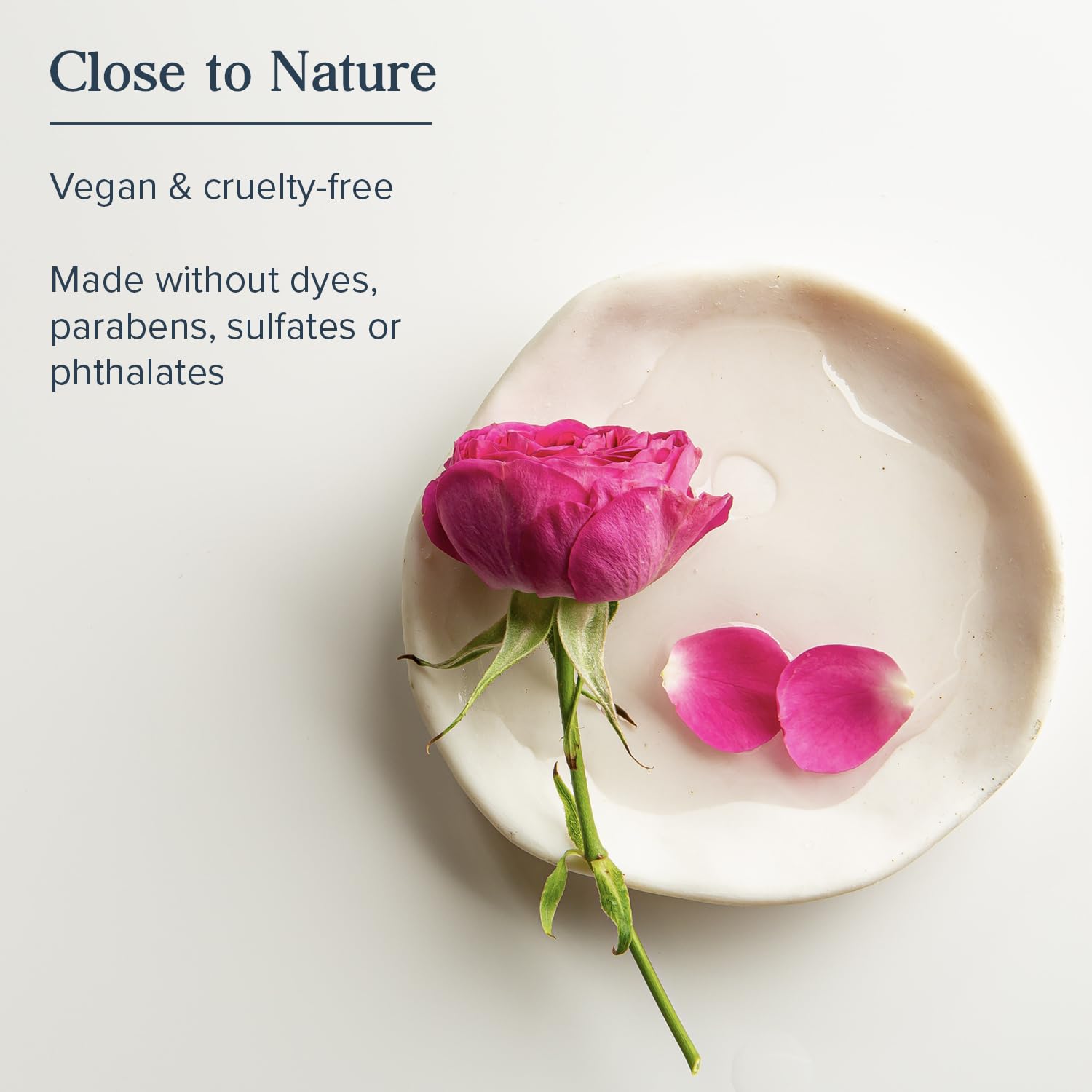 HERITAGE STORE Rose Oil texture swirl indicates lightweight, non-greasy hydration.
