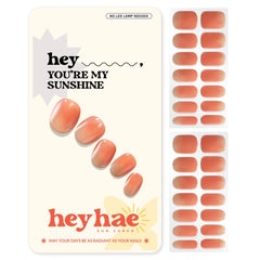 Heyhae semi-cured nail strips with ombre orange packaging for at-home manicure