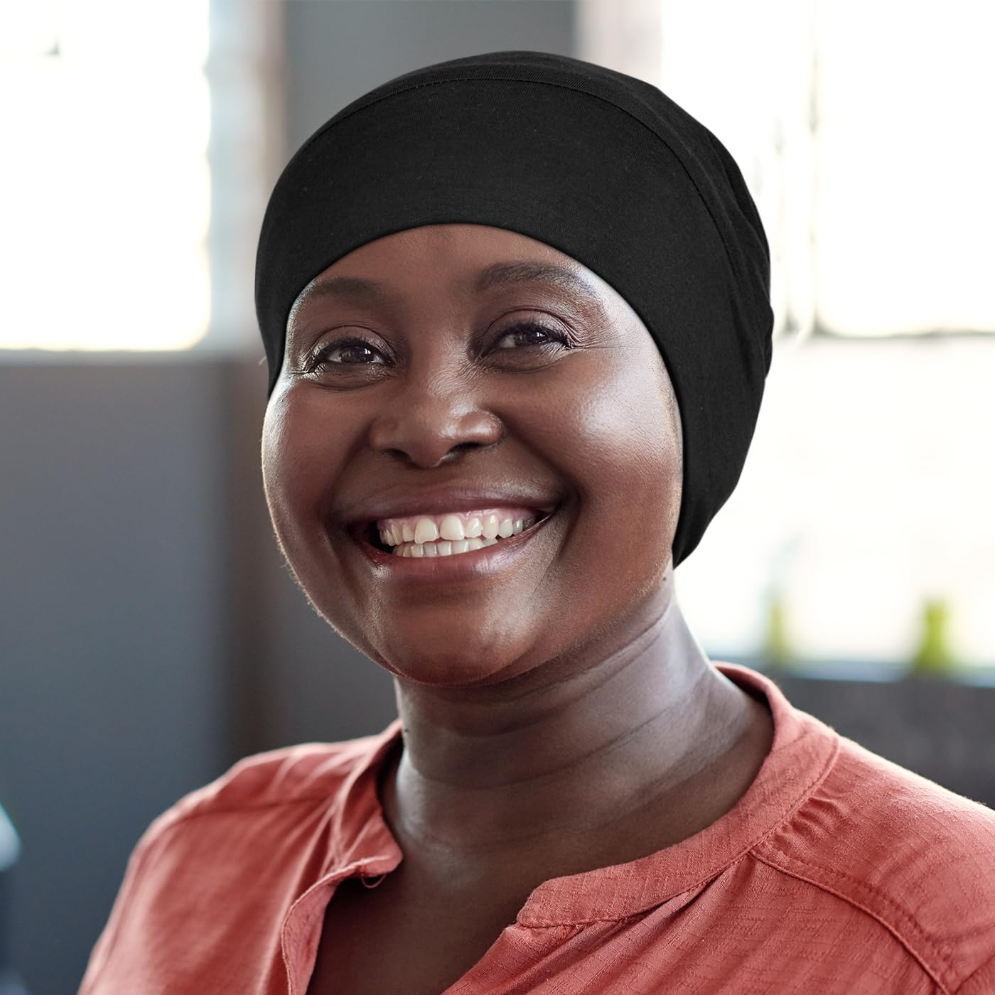 Heywhose chemo-hair-loss cap image suggests supportive wear during treatment days