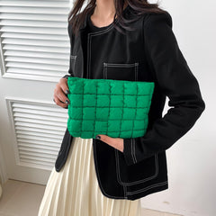 HFLZBRO Puffy makeup bag green roomy interior for easy storage.