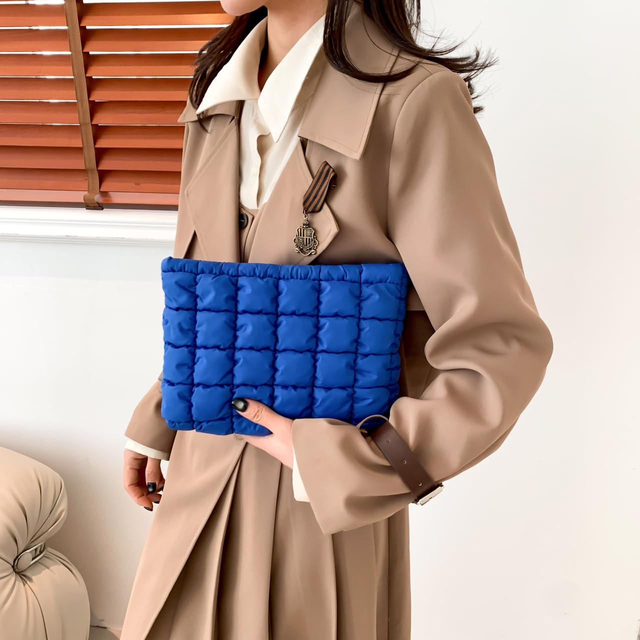 HFLZBRO Puffy quilted makeup bag blue side pocket offers quick access.