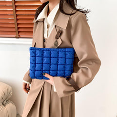 HFLZBRO Puffy quilted makeup bag blue side pocket offers quick access.