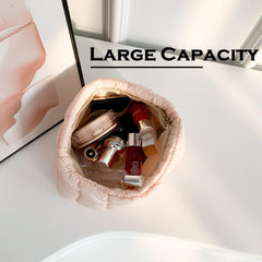 HFLZBRO Puffy quilted makeup bag pink top zipper enables secure access.